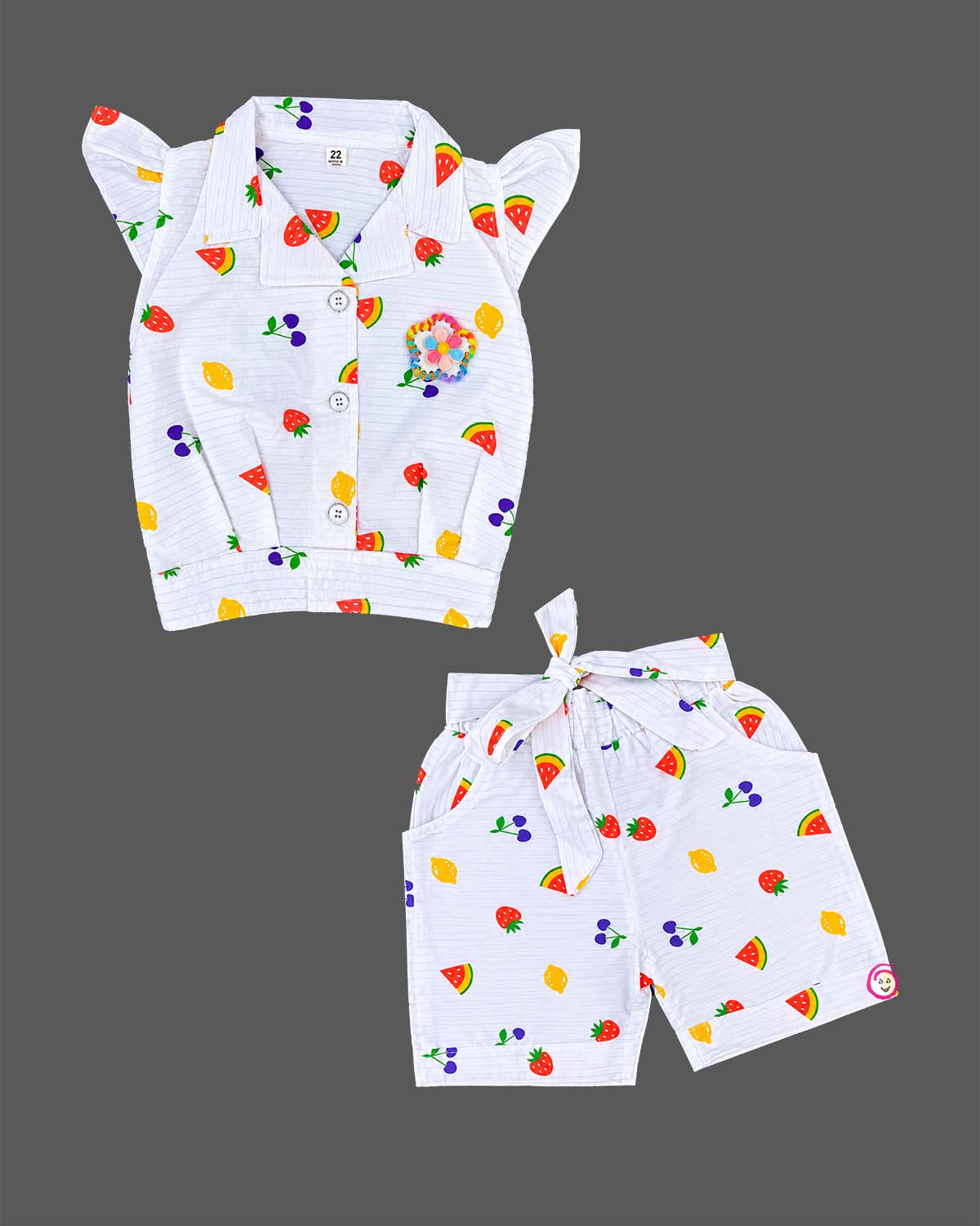 Girls fruit print notch collar top with flutter sleeves and matching tie-belt shorts set.