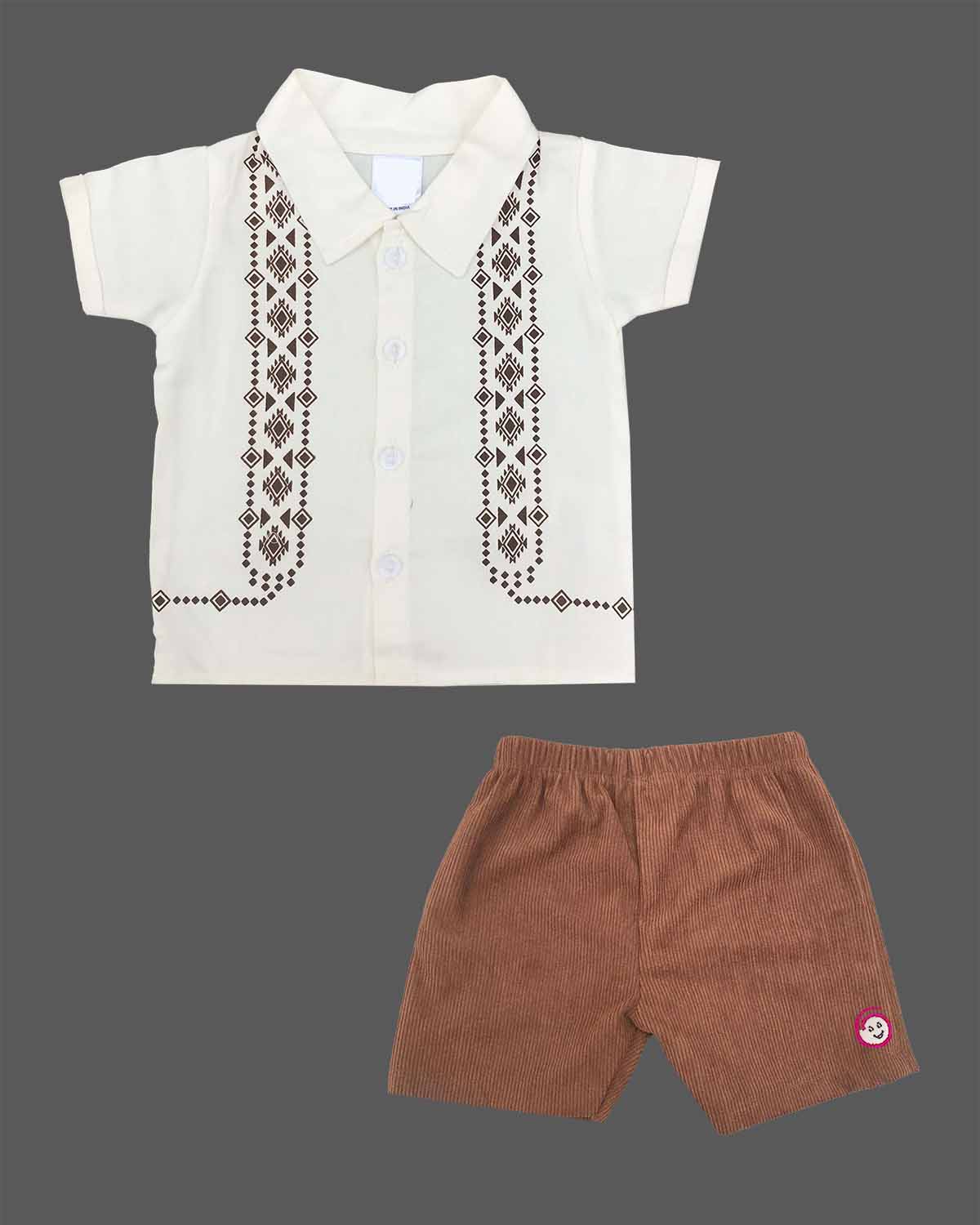 Short sleeve collared shirt with geometric front motifs paired with ribbed corduroy shorts for boys