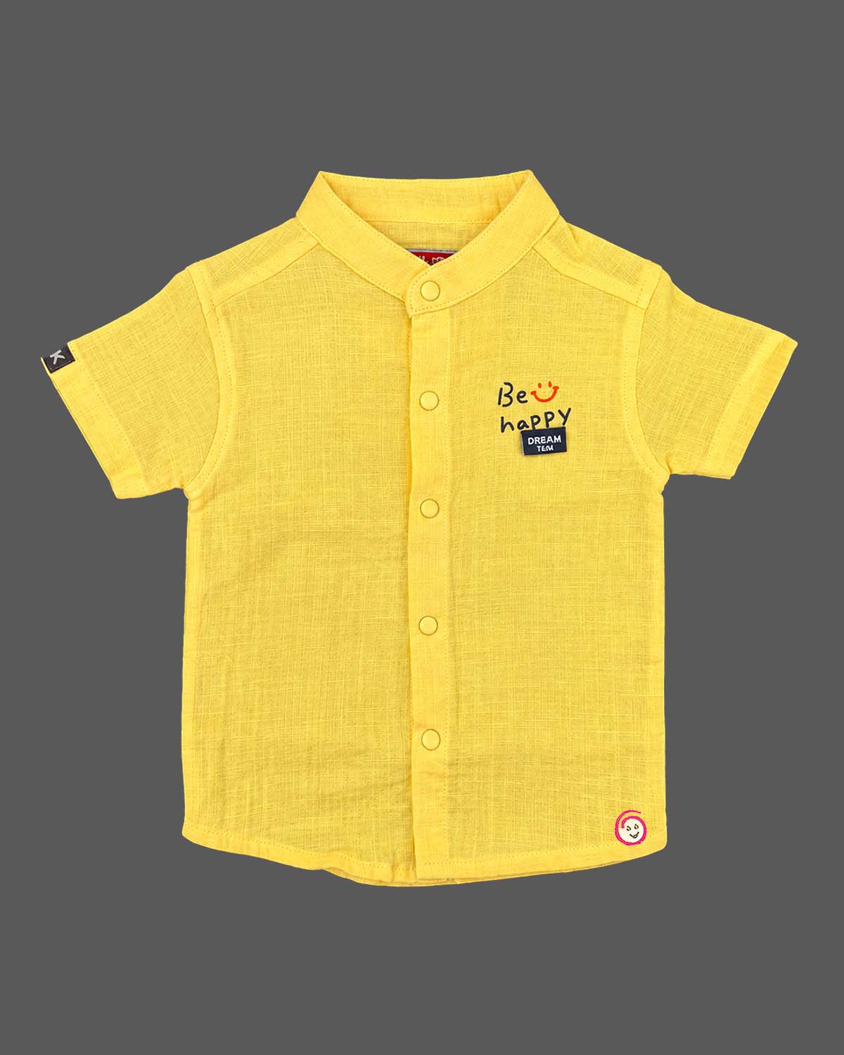 Toddler wearing short-sleeve button-down shirt and shorts designed for kids western wear.
