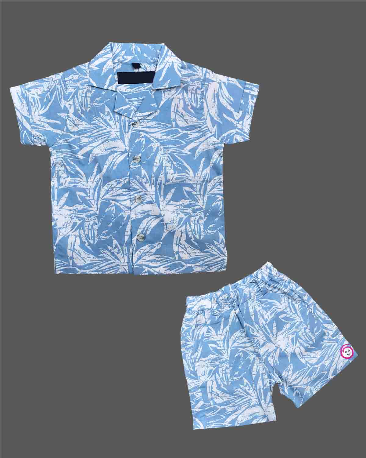 Two piece printed short sleeve shirt and elastic shorts set for young boys
