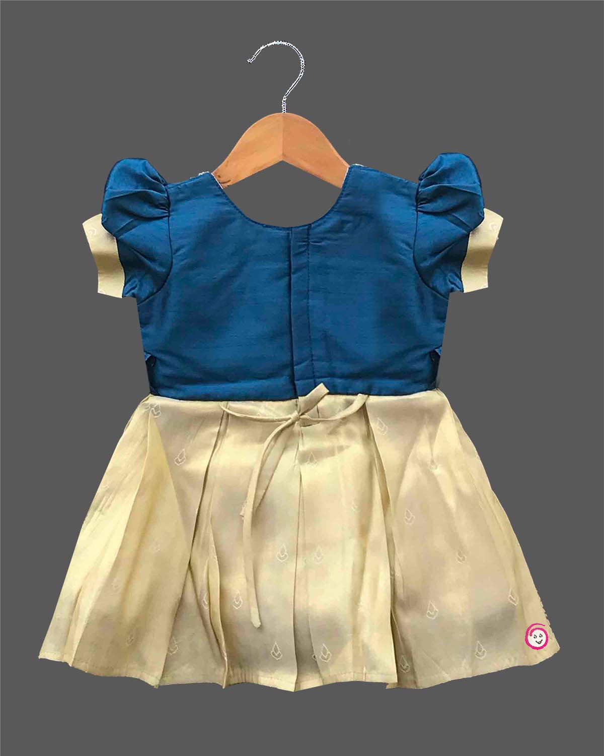 Baby girl silk blend traditional frock featuring zari border and puff sleeves for cultural events