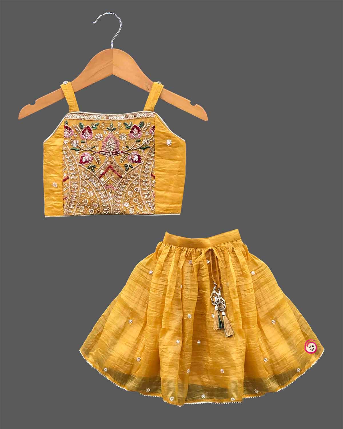 Kids silk embroidered sleeveless choli top matching jacket and pleated flared lehenga skirt set