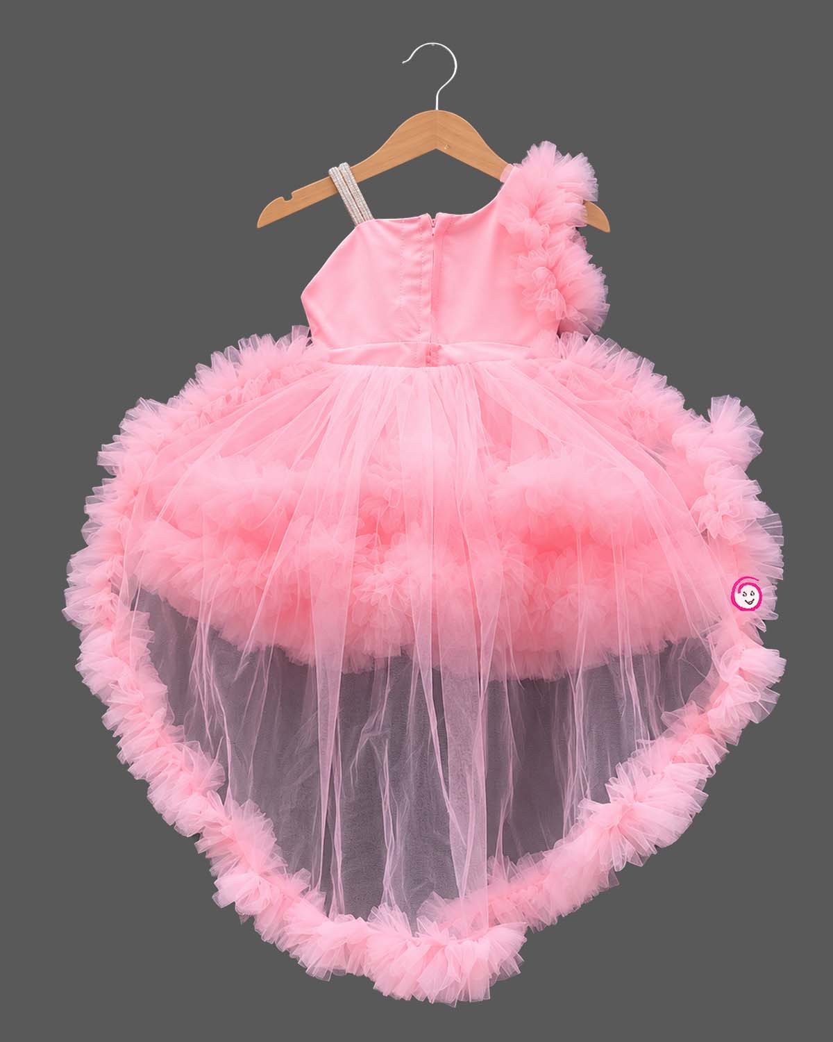 Tiered ruffle high-low silk frocks for baby girl featuring asymmetrical shoulder frills and sequin embroidery.