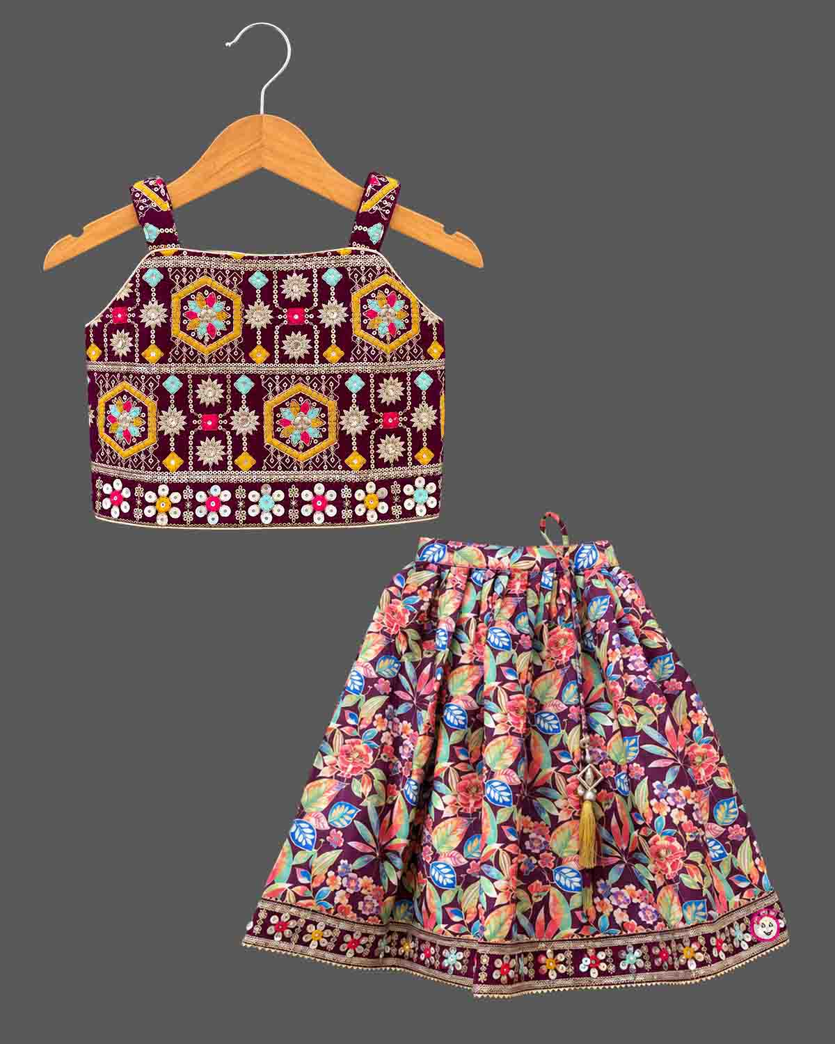 Geometric zari embroidered choli langa for kids set featuring mirror work choli and printed skirt