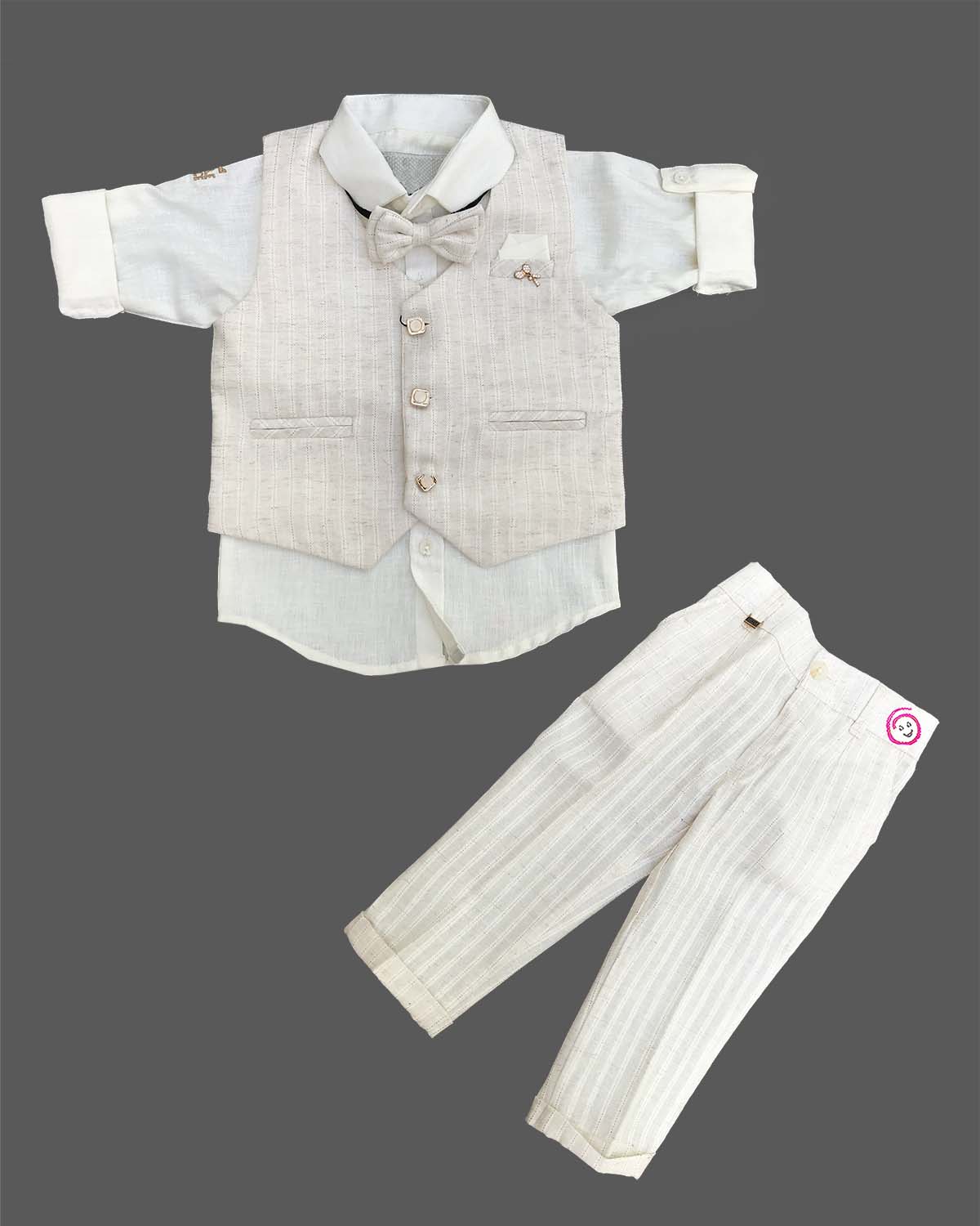 Boys textured linen waistcoat set featuring a collared shirt, matching bowtie, and tailored trousers.