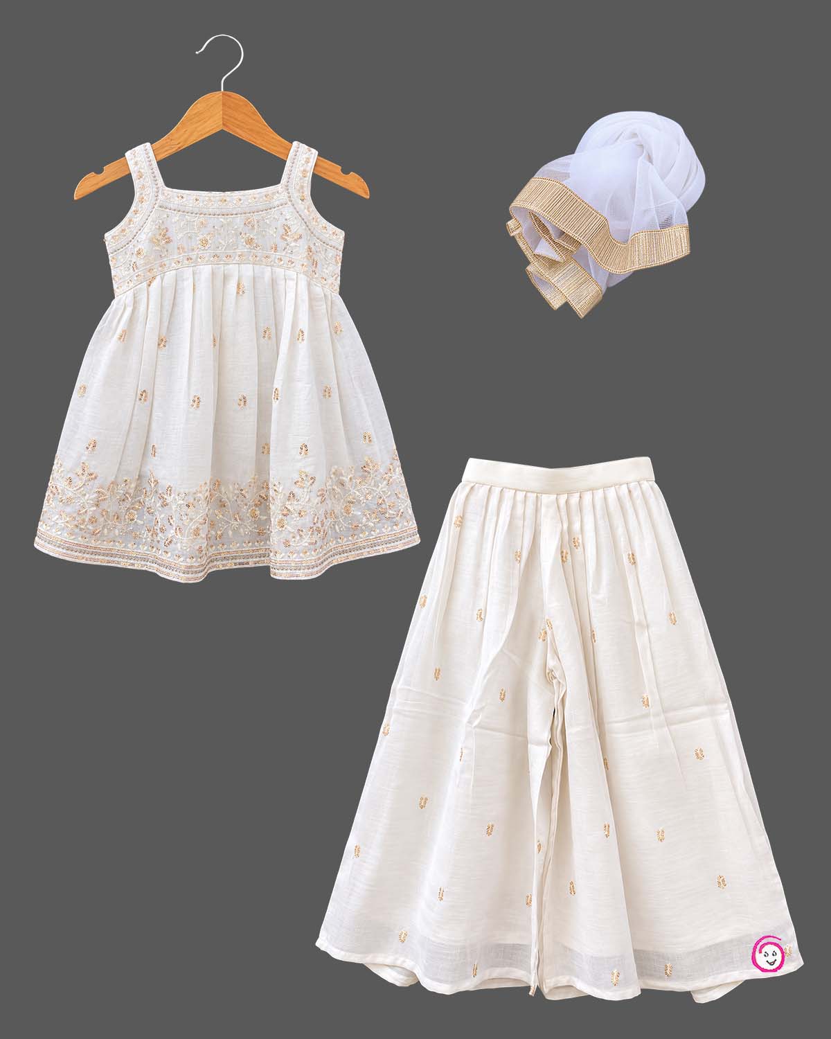Sleeveless kurti for kids featuring floral embroidery, paired with wide-leg palazzo pants and gold-bordered dupatta.