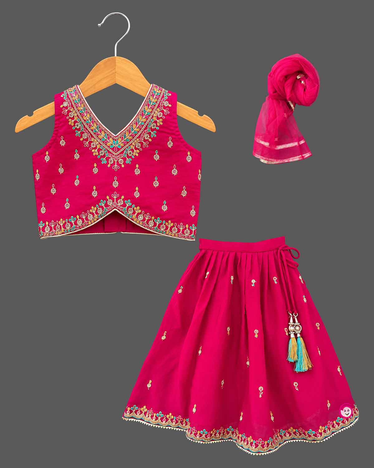 Embroidered V-neck lehenga choli for kids set featuring intricate threadwork, pleated skirt, and sheer dupatta