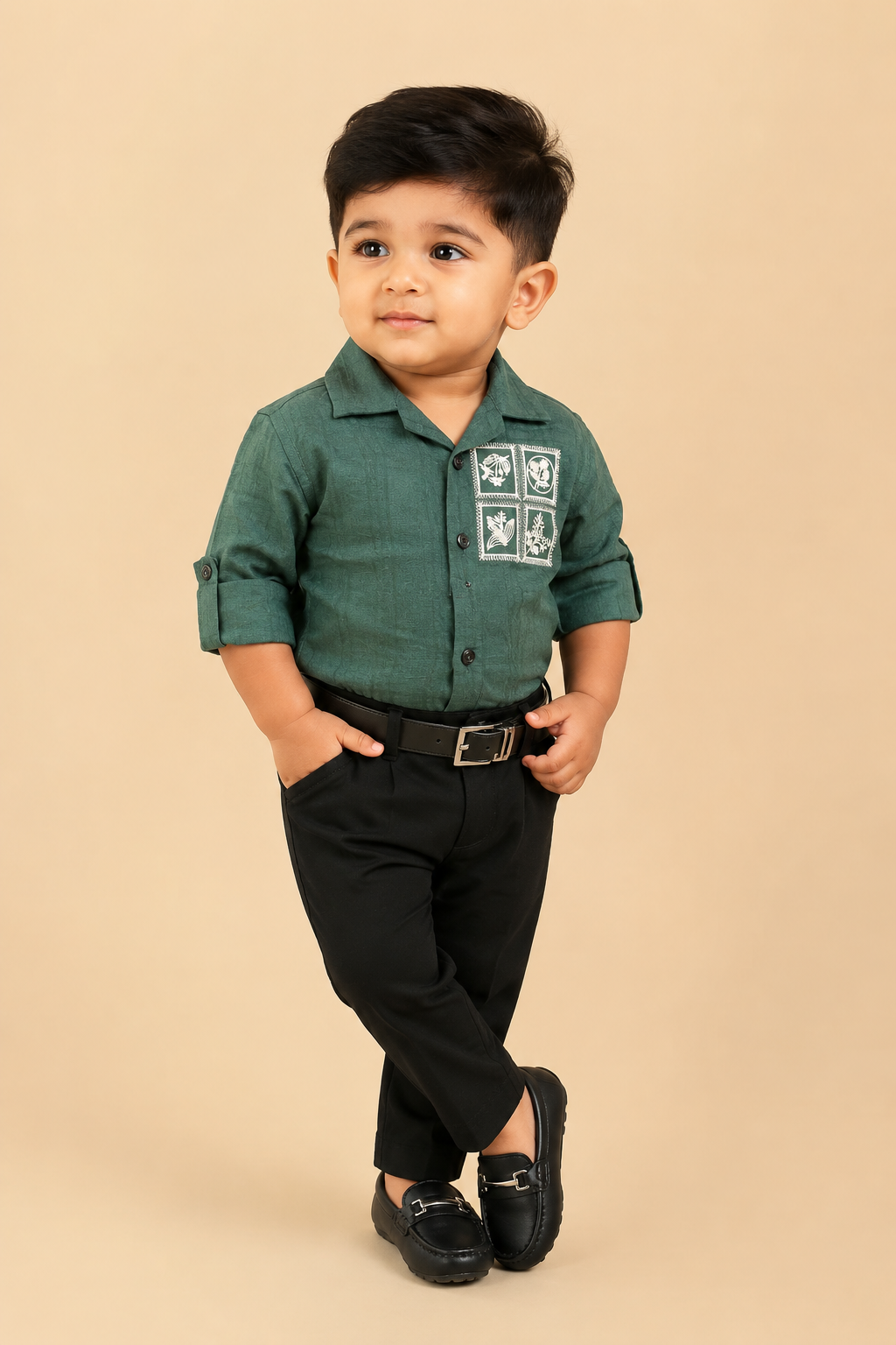 Dapper two-piece set for little gentleman featuring a textured notch-collar shirt with embroidered chest patches, paired with tailored pant and a buckle belt.