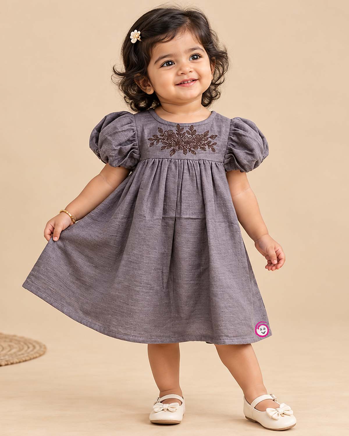 Baby girl embroidered frock with puff sleeves and chest floral detail for casual events