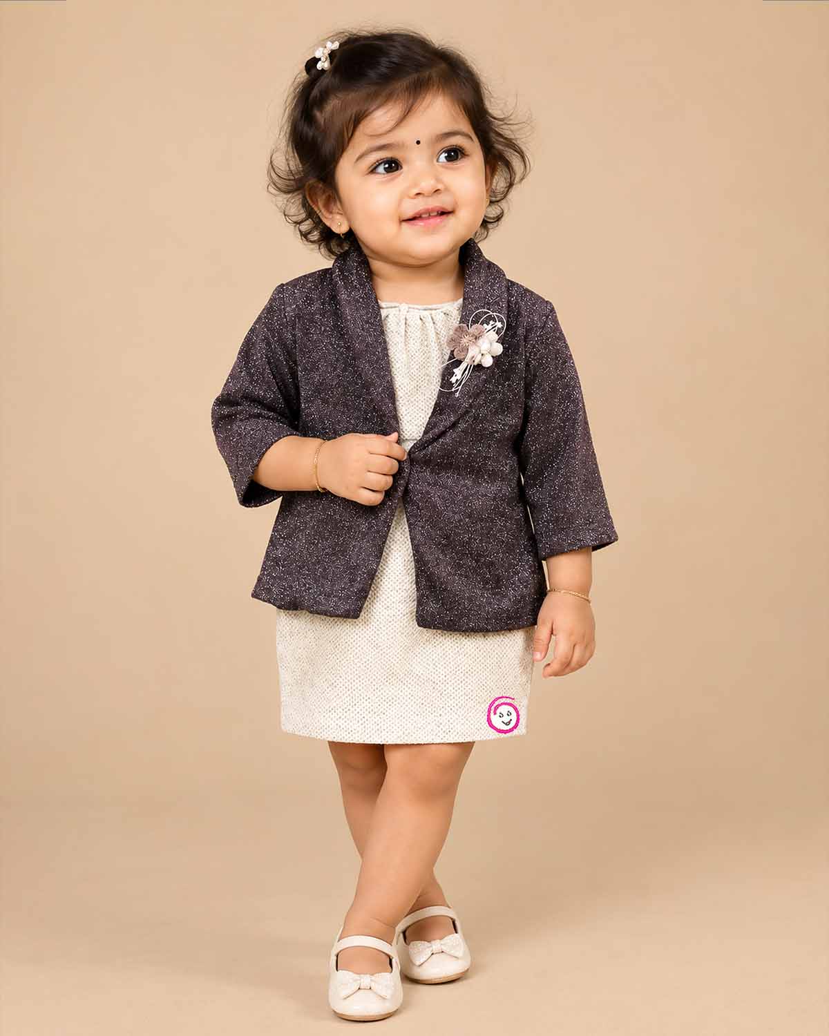 Baby girl shimmer jacket midi dress with floral brooch appliqué for birthday parties and festive celebrations.