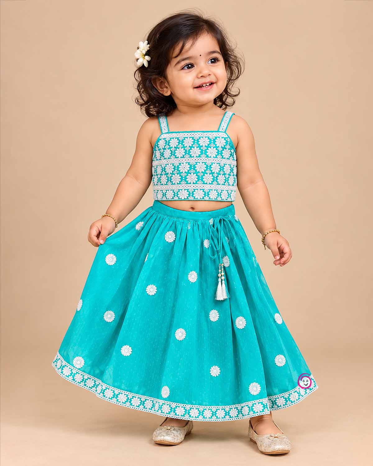 Embroidered choli lehenga set with sleeveless top and pleated skirt for festive events.