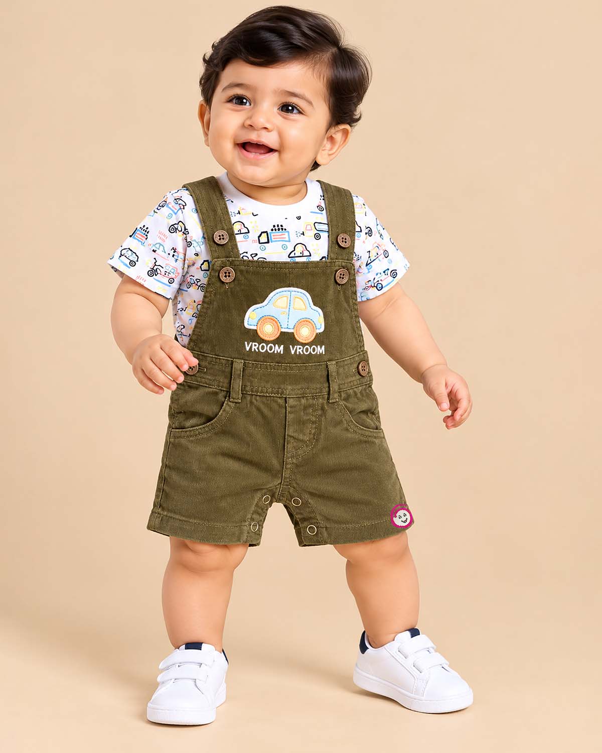 Boys dungaree set featuring short sleeve car print tee and olive dungaree shorts