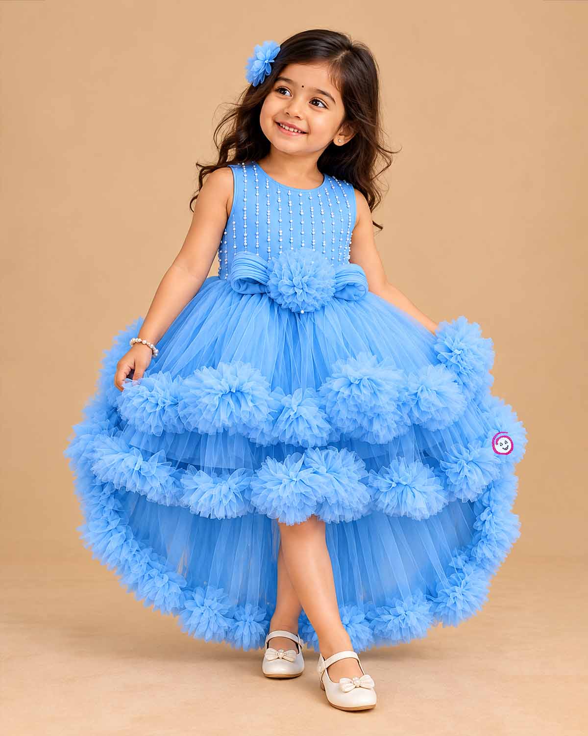 Baby girl net frock with pearl embellishments and ruffled tiered skirt for birthday party