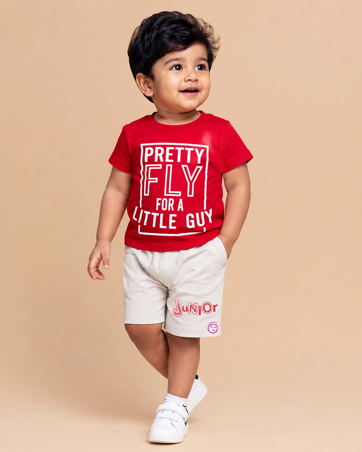 Red graphic t-shirt with Pretty Fly typography print and light grey elasticated shorts baby boy top and shorts set for summer vacations, playdates, and park outings