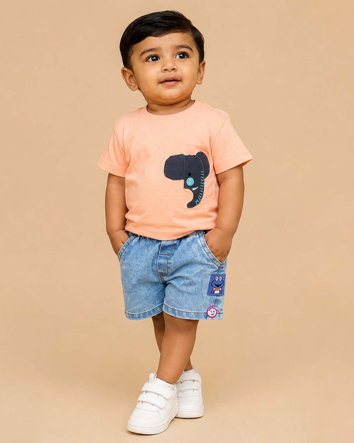 orange t-shirt with dark grey elephant patch and light wash blue denim elasticated shorts baby boy top and shorts set for summer vacations, playdates, and park outings
