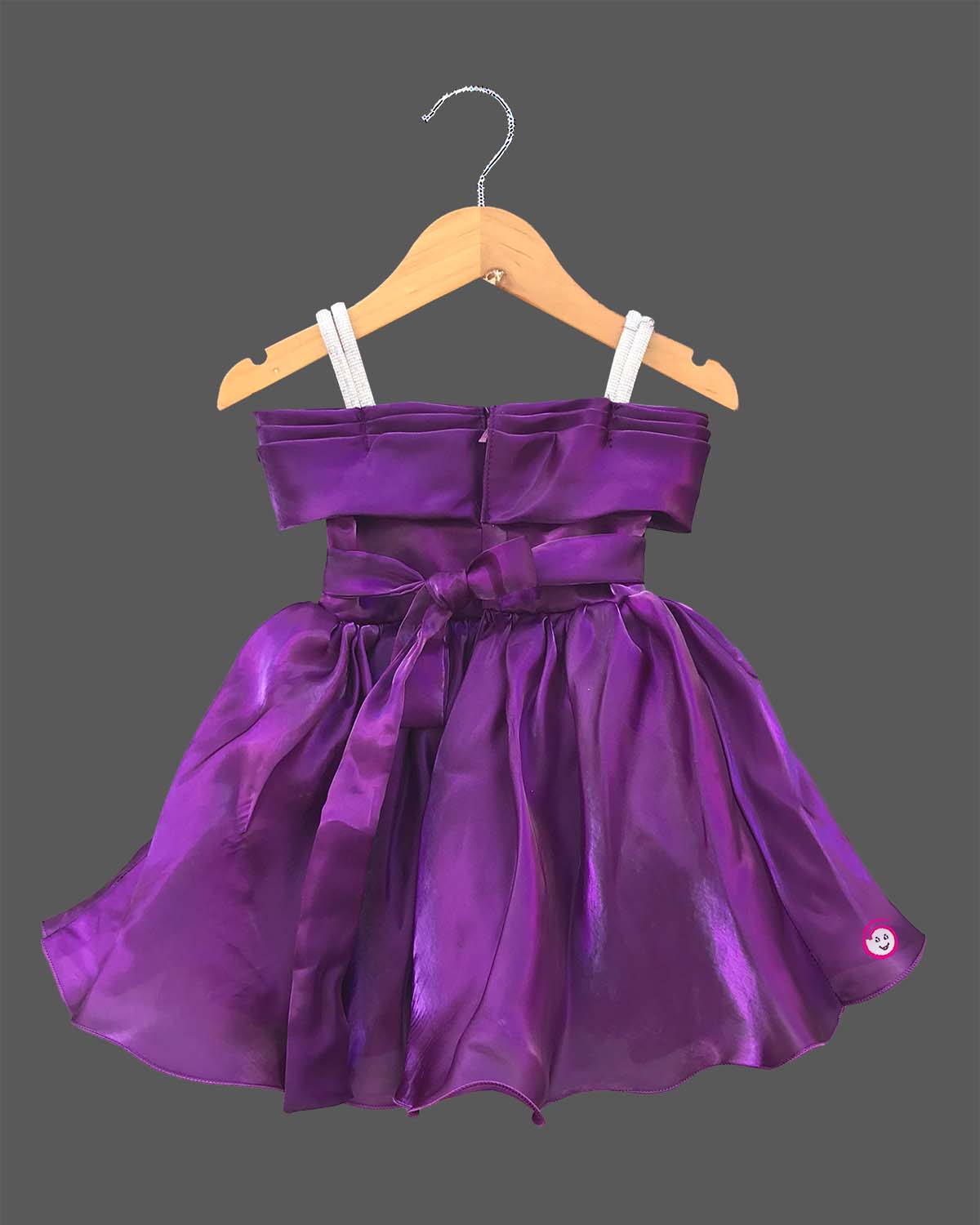 Deep purple satin and organza party frock for baby girl featuring oversized side bow, rhinestone shoulder straps, and crystal brooch for first birthday outfit for girl and wedding celebrations