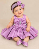 Baby girl satin party frock with oversized bow and crystal waist belt