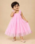 Little princess pink net frock with shimmer tulle overlay and floral shoulder embellishments for party wear