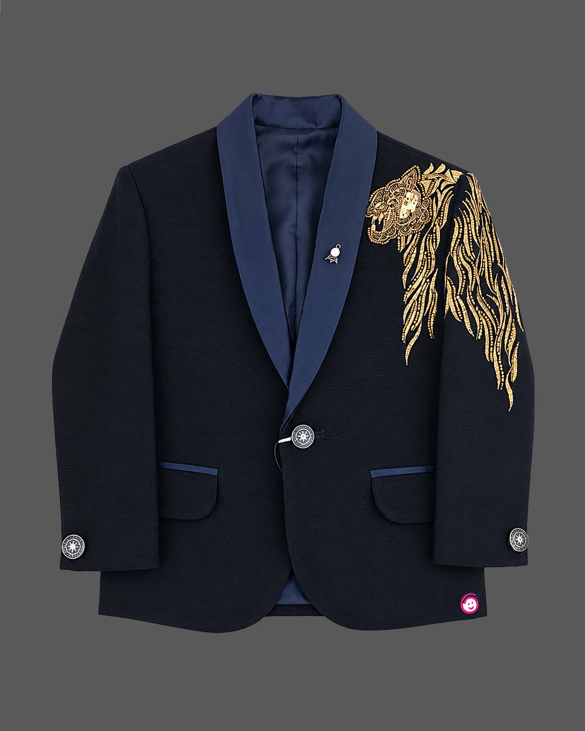 Boys blue designer tuxedo suit set featuring a shawl collar blazer with intricate gold shoulder embroidery, shirt, waistcoat, bow, and matching blue formal pant