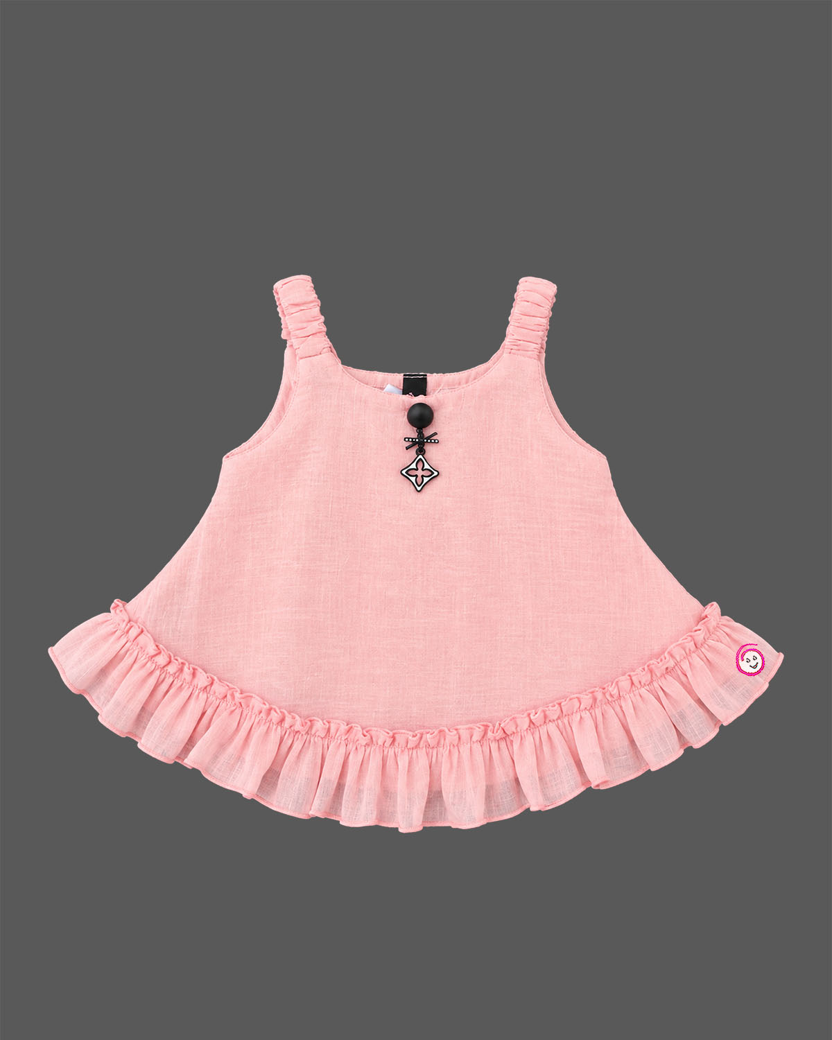 Infant cotton ruffle top with frill hemline and decorative charm detail for baby girl party wear
