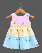 Sleeveless embroidered seersucker tiered frock with scoop neck and frill layers for toddlers.