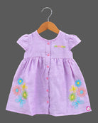 Infant gathered button frock with floral hem embroidery and baby casual wear dress styling