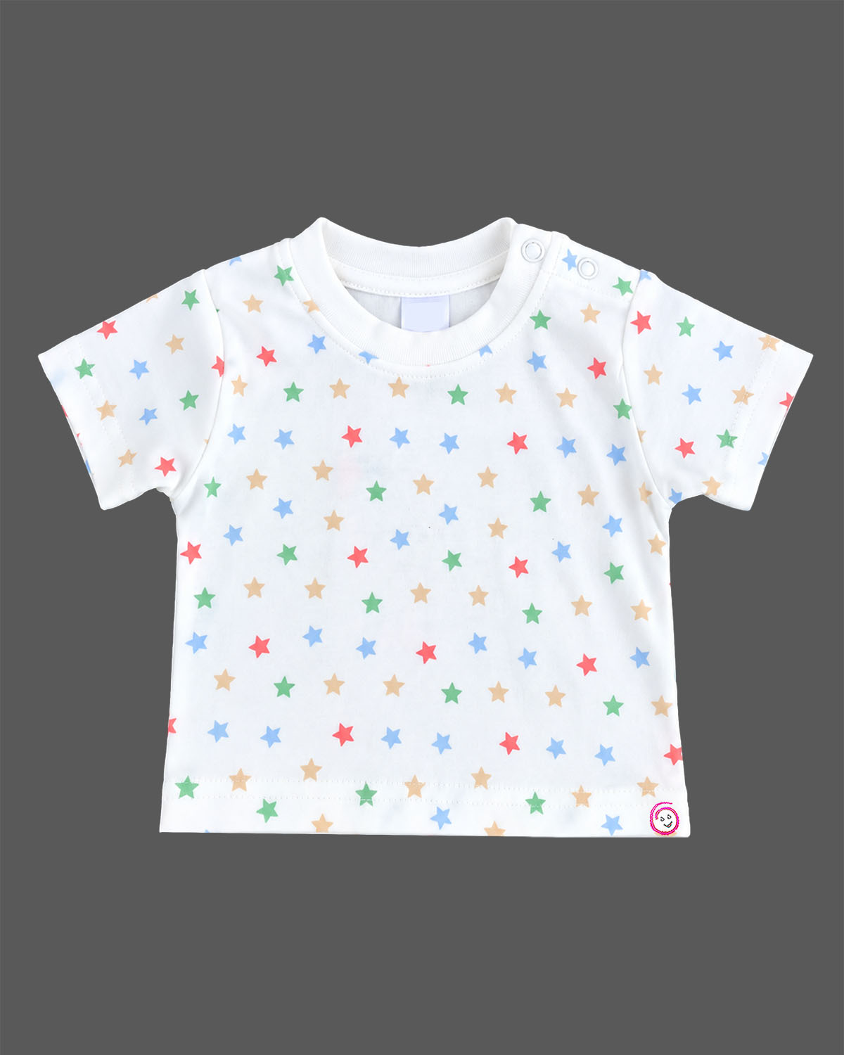 Baby clothes set featuring a white star print t-shirt and beige printed romper
