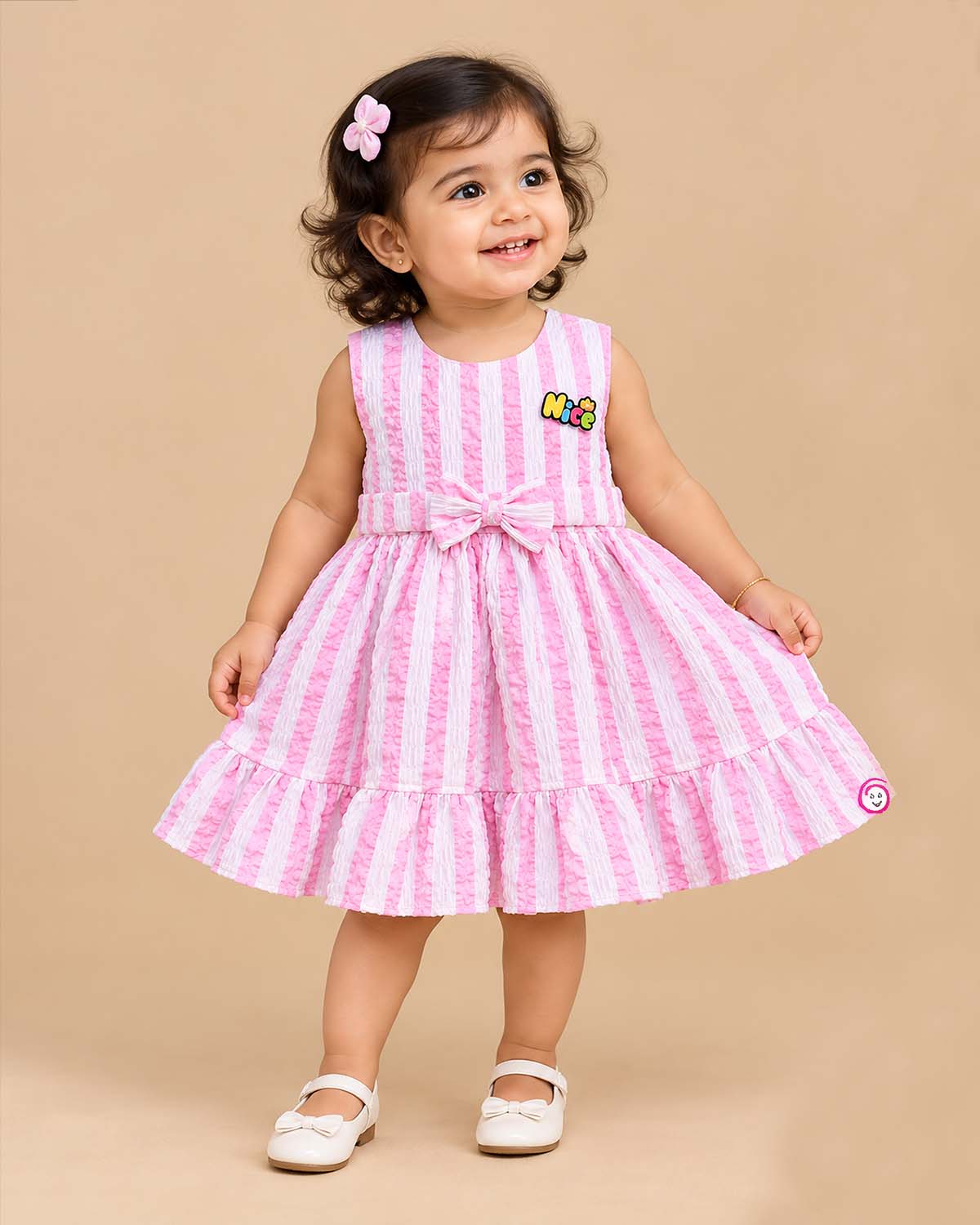 Baby girl seersucker stripe frock with bow detail for party wear and celebrations