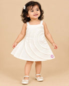 Infant cotton frock with layered circular panel detail for casual playdates
