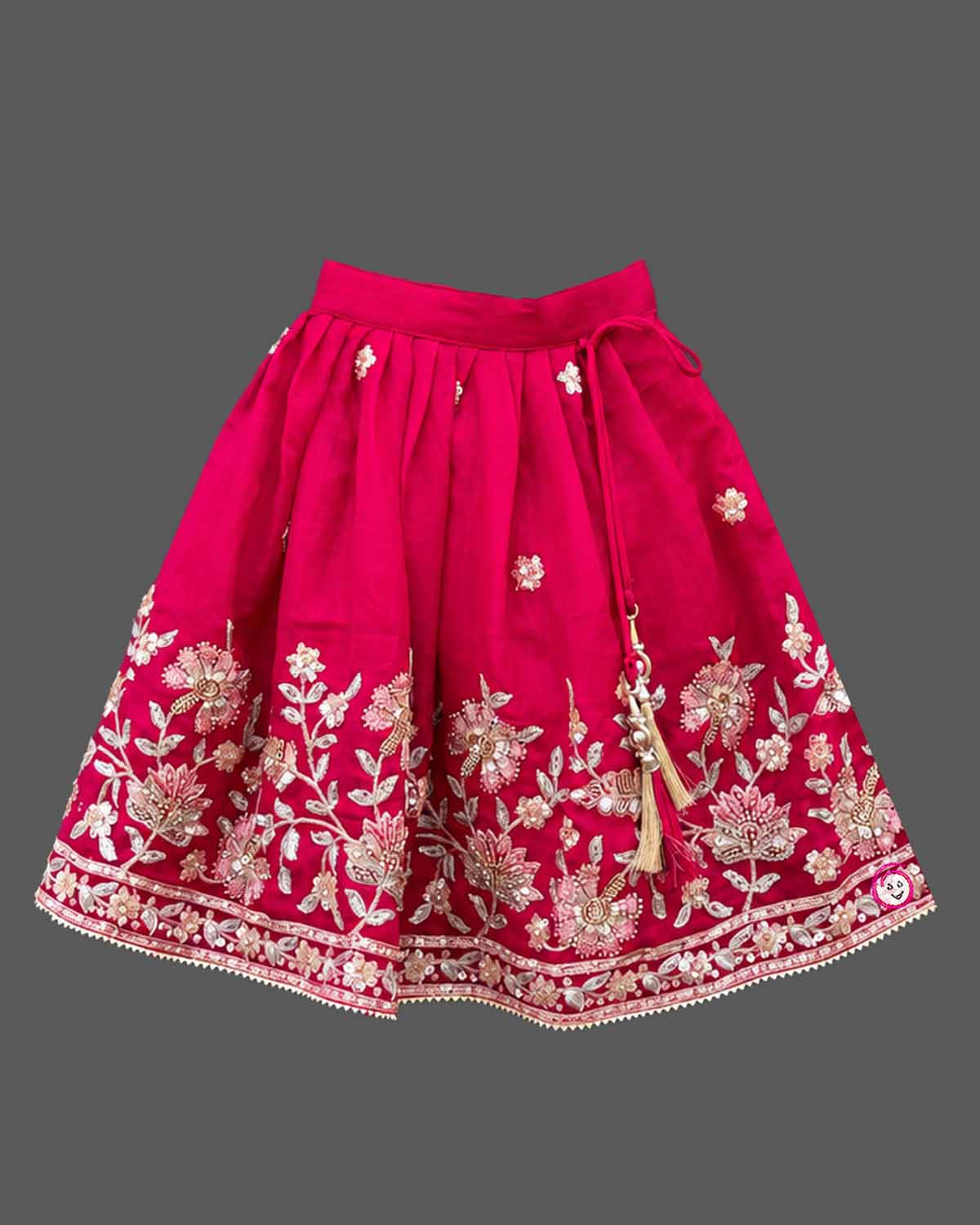 Lehenga choli for kids with beaded floral yoke, sleeveless round neck choli and pleated skirt with tassel tie