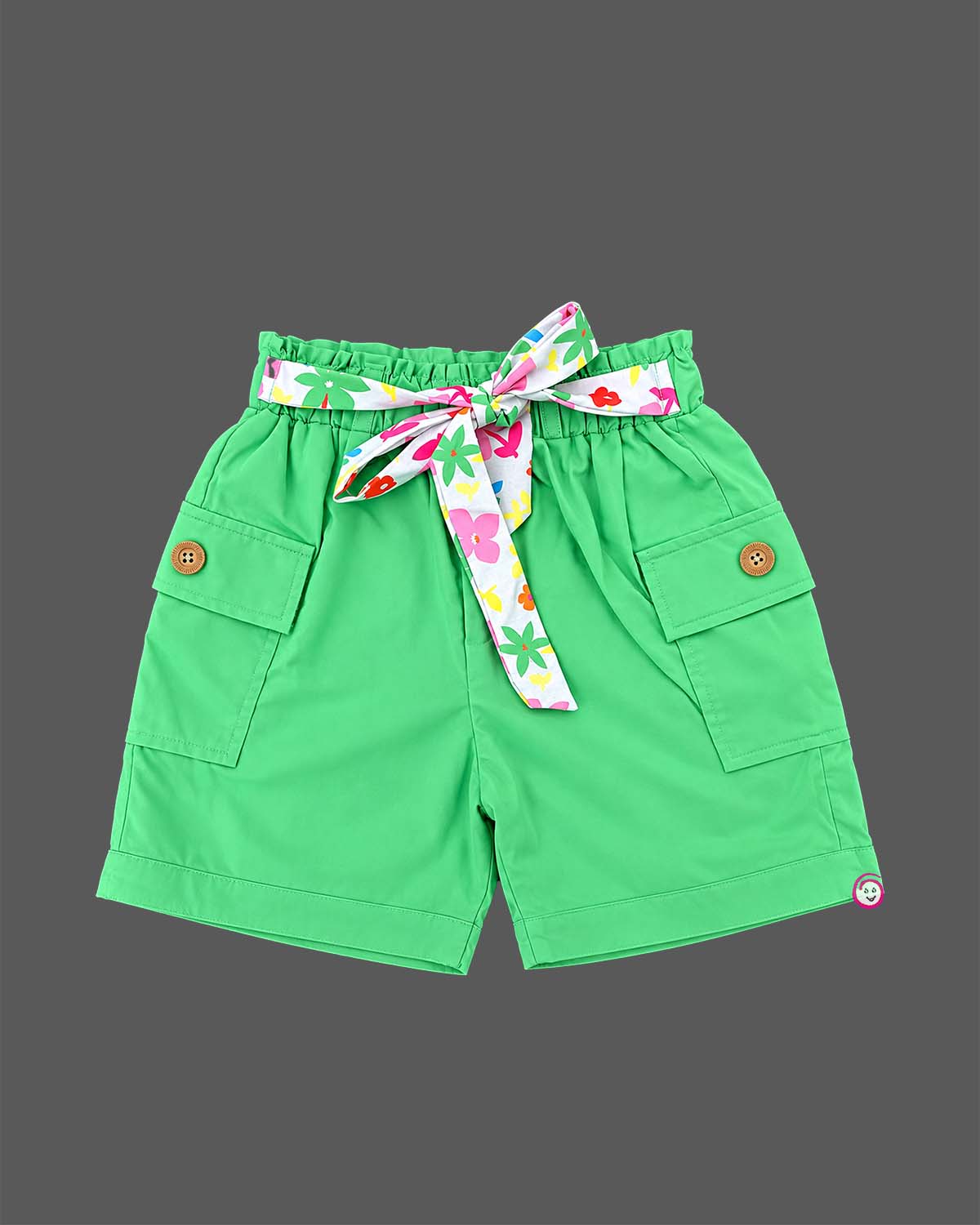 Girls floral peplum camisole top with front buttons and elasticated waist shorts featuring utility pockets.