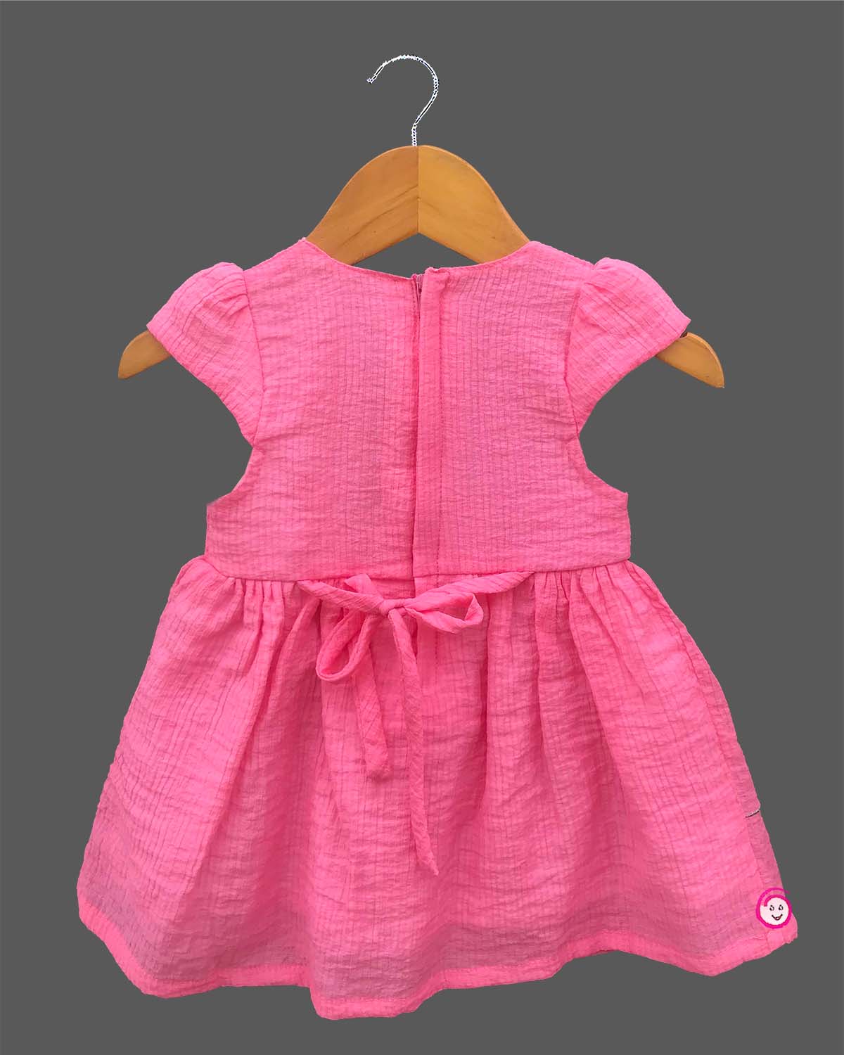 Little princess cotton casual frock featuring floral embroidery, cap sleeves, and decorative waist accent for everyday comfort