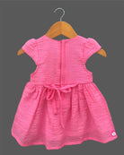 Little princess cotton casual frock featuring floral embroidery, cap sleeves, and decorative waist accent for everyday comfort