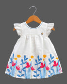 Baby girl cotton frilled frock with embroidered botanical hem and cap sleeves