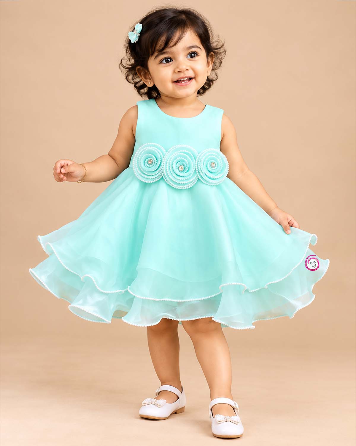 Sleeveless tiered organza party frock with beaded waist rosettes and ruffled hem