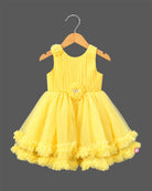 Sleeveless pleated bodice tulle frock with ruffled tiered hem and waist floral appliqué accent.