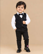 Boys textured layered waistcoat suit set with shirt, bow tie, sleeve roll-up tabs, and pant.