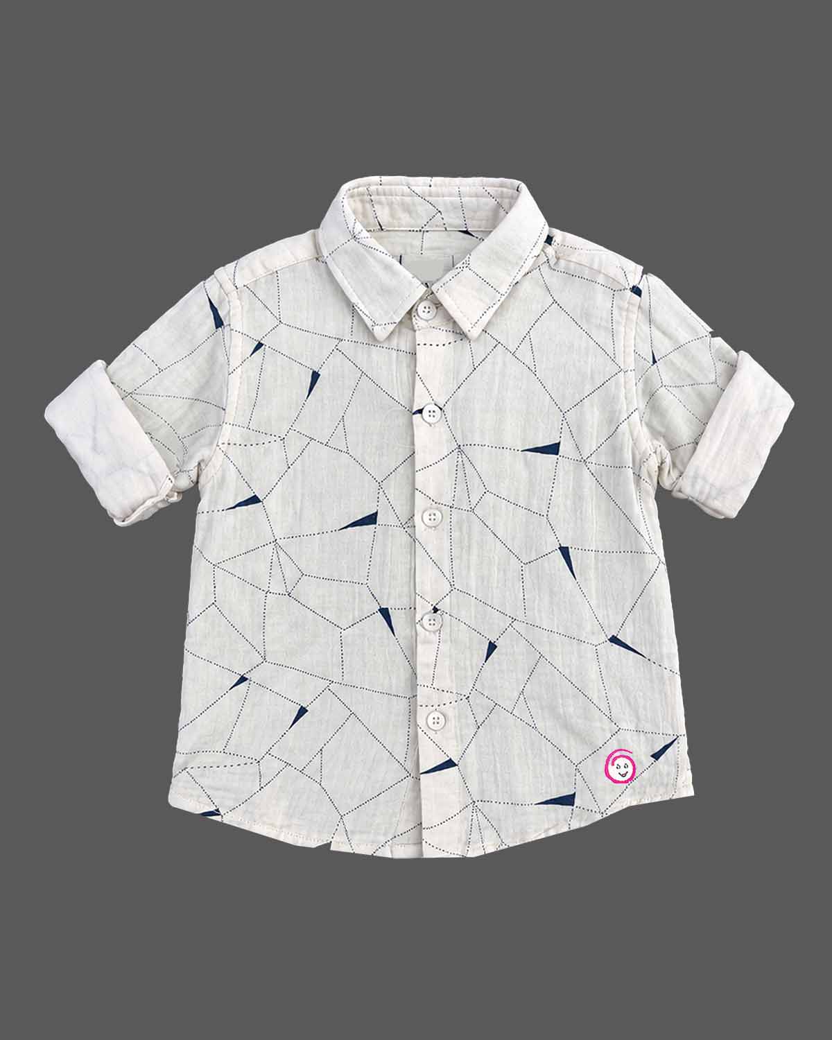Boy button-down shirt with geometric linear pattern and roll-up sleeves for party wear for boys.