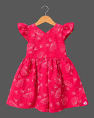 Cotton Frock For Baby Girl with flutter sleeves, V-neck bodice, gathered skirt and sketch floral print