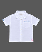 Button down shirt and shorts set styled as western dress for boys with chest embroidery.