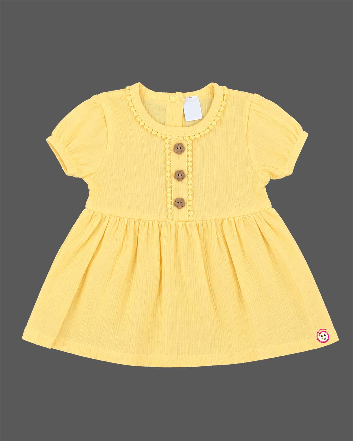 Infants frock in soft textured cotton fabric for casual playdates and baby clothes collection.