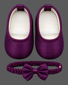 Baby party wear dress featuring a sleeveless satin fit and flare silhouette with front oversized bow and booties set.