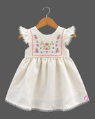 Frill sleeve organic frock with embroidered yoke and casual frock styling details.