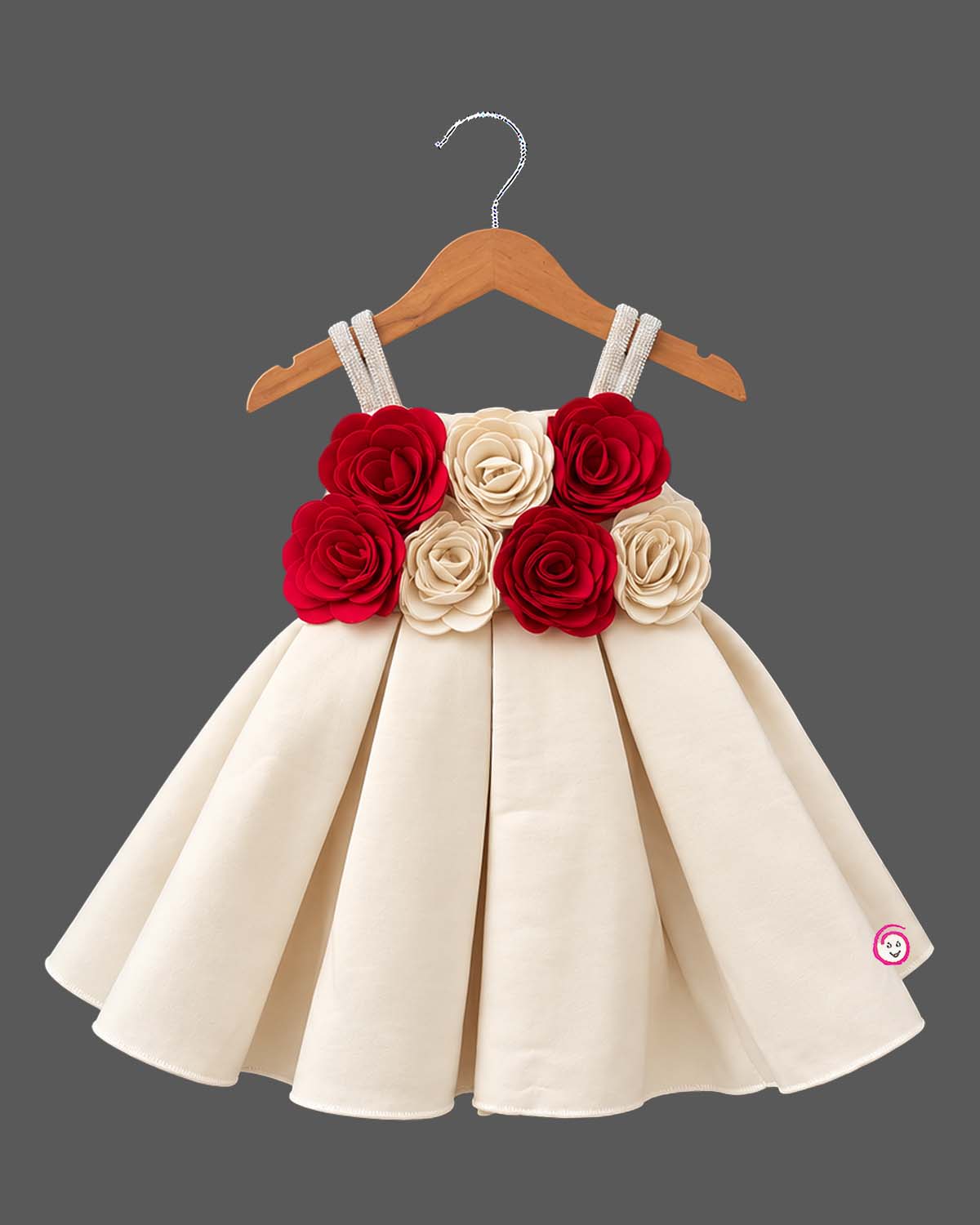 Silk frocks for baby girl featuring structured box pleats and dimensional fabric rosettes on straps