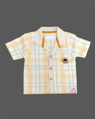 Stylish casual two-piece co-ord set for toddler boys featuring a check-patterned Cuban collar short-sleeve shirt with chest embroidery paired with matching shorts and a rope belt.