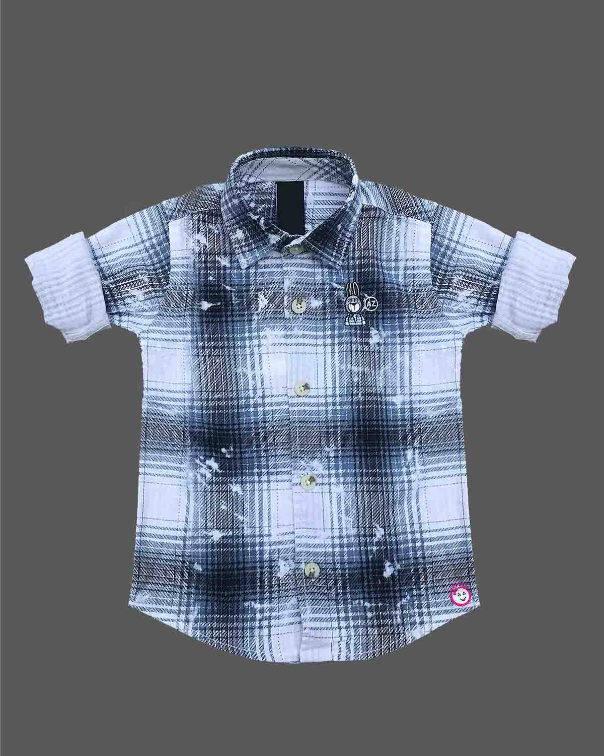 Toddler boy wearing blue and white check shirt with rolled up full sleeves for casual outing