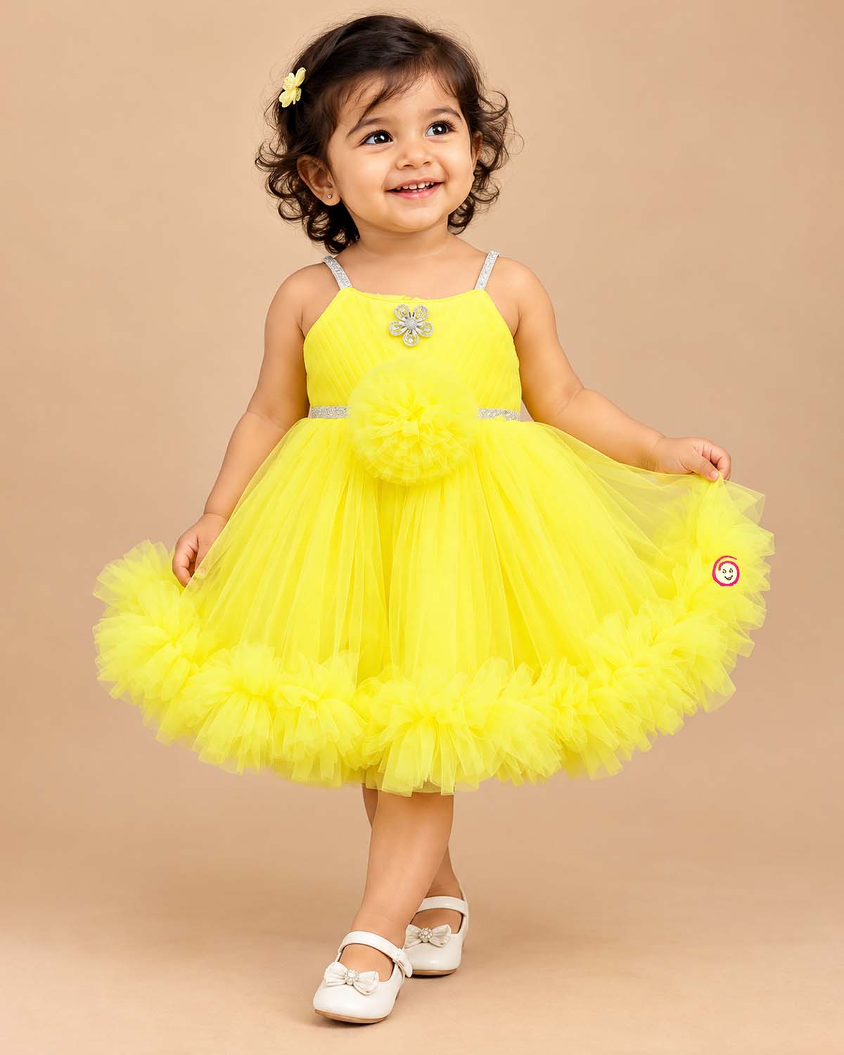 Ruffled tulle baby party wear dress with embellished straps, pom-pom detail, booties, headband