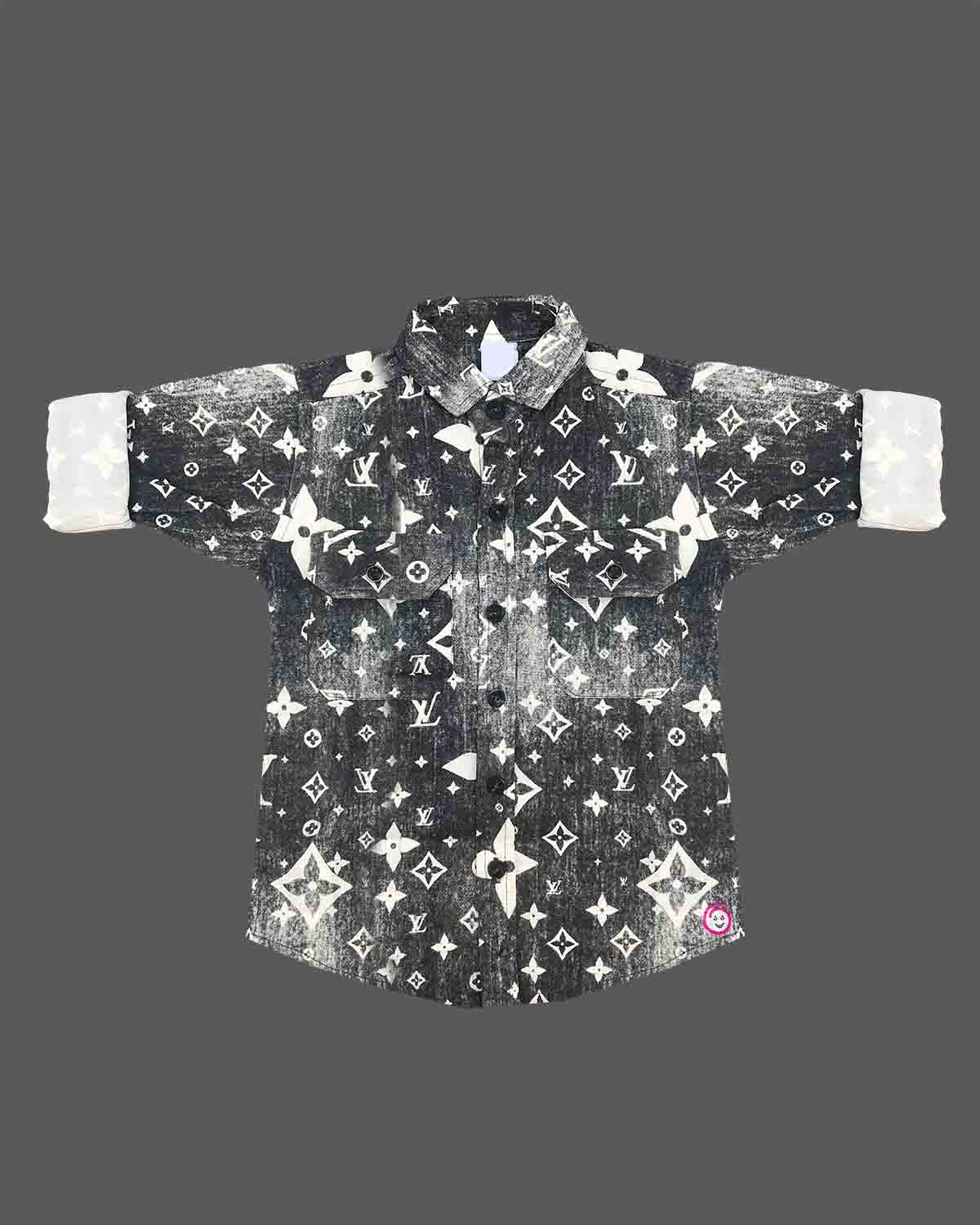 Stylish toddler boys shirt featuring an all-over classic designer motif print with double front flap pockets.
