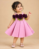 Baby party wear dress featuring structured scuba fabric and 3D floral neckline