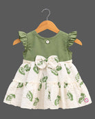 Toddler girls tiered frock featuring ruffled flutter sleeves, a waist bow, and botanical leaf prints.